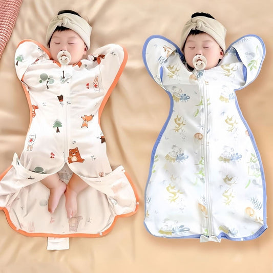Two sleeping babies in zip-up swaddle sleeping bags